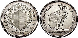 Moneda de un franco del Tesino emitida en 1813 con texto en italiano