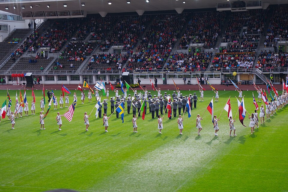 Desfile de delegaciones durante la ceremonia de inauguración de un evento internacional
