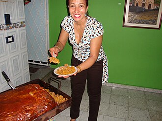 Mujer tolimense con lechona
