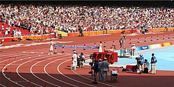 Wanjiru aproximándose a la meta de la maratón de los Juegos Olímpicos de Pekín 2008