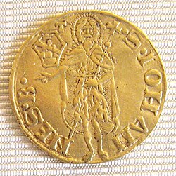 Reverso de un florín con otra representación de San Juan Bautista, protector de Florencia.