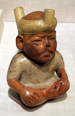Huaco moche representando a un niño con paladar hendido