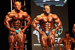 Phil Heath y Kai Greene compitiendo en el Mr Olympia 2012