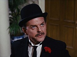 David Tomlinson en el papel de George W. Banks