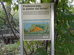 Cartel de advertencia en la parte francesa
