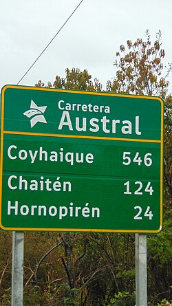 Letrero indicador de distancias en la ruta