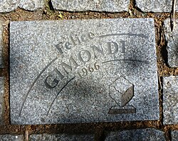 Losa de pavimento dedicada a Gimondi