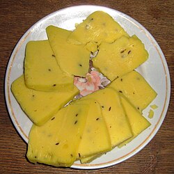 Queso Jāņi servido tradicionalmente en el festival de verano Jāņi.