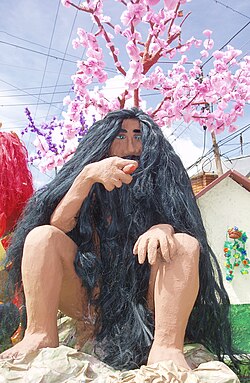 Representación escultórica de un mohán tradicional