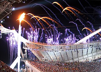 Encendido de la llama olímpica en la ceremonia de apertura