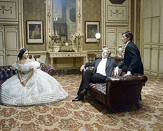 Escena de la película El gatopardo con Burt Lancaster, Alain Delon y Claudia Cardinale