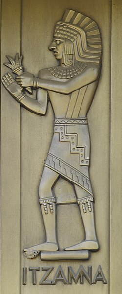 Escultura monumental de deidad en biblioteca