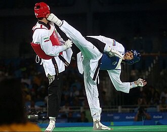 Combate de taekwondo durante los juegos olímpicos