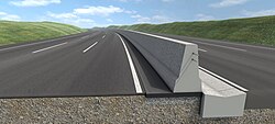 Sección moderna de una autopista equipada con barreras de seguridad.