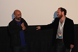 Gaspar Noé junto a Colin Geddes en un festival.