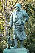 Estatua del samurái Saigo Takamori paseando a su perro