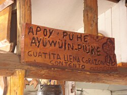 Refrán escrito en mapudungún y español chileno sin seguir un estándar ortográfico fijo.