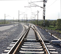 Vía con tercer carril