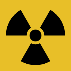 Símbolo de peligro de radiación ionizante.
