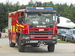 Vehículo de emergencia en las instalaciones de un aeropuerto británico.