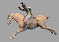 Terracota representando a una jugadora de polo, Dinastía Tang.
