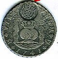 Moneda española con resello circular de la India Portuguesa