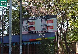 Valla publicitaria con voseo en El Salvador