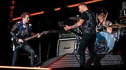 Matt Bellamy, Chris Wolstenholme y Dominic Howard en 2019