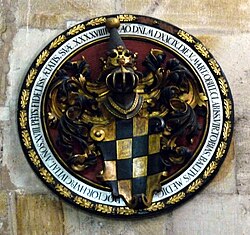 Escudo funerario de 1589 en la Frauenkirche de Esslingen, Alemania, que muestra abreviaturas con virgulilla.