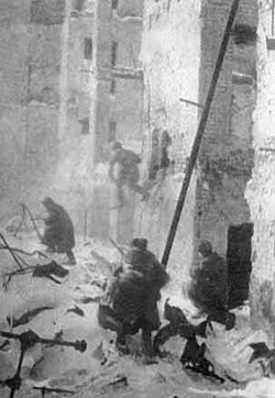 Escena de combate urbano en ruinas