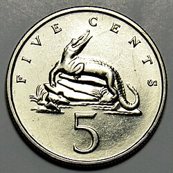 Moneda jamaiquina conmemorativa con la imagen de un cocodrilo americano.