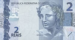 Representación de monedas y billetes del sistema monetario brasileño.