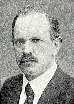 Retrato fotográfico de Robert Grimm