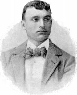 Retrato fotográfico de Nikolaos Andriakopoulos, medallista olímpico griego.