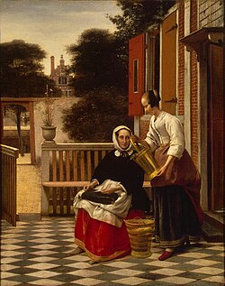 Señora y sirvienta con un cubo