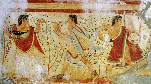 Bailarines y músicos etruscos