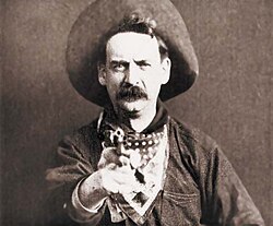 Justus D. Barnes en la película Asalto y robo de un tren de Edwin S. Porter.