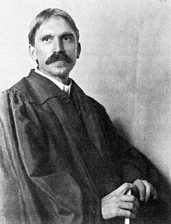 Retrato fotográfico de John Dewey en el año 1902