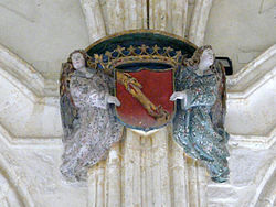 Guion de los reyes de Castilla entre ángeles tenantes en el monasterio de Santa María de El Paular