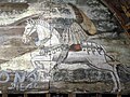 Pintura de San Jorge en el muro alto de la capilla