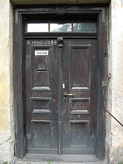 Inscripción con tiza en una puerta en la Epifanía