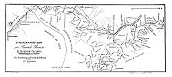 Mapa detallado del puerto mostrando la carretera nacional y el ferrocarril