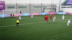 Partido de fútbol femenino en Singapur 2010