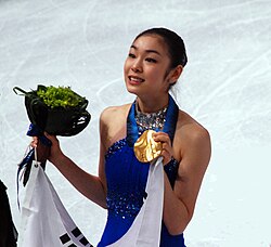 Kim en la ceremonia de medallas