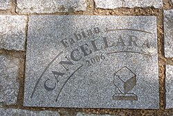 Losa de pavimento dedicada a Cancellara en Roubaix
