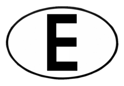 Ejemplo de la placa o etiqueta ovalada de color blanco representando a España