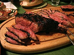 Preparación de carne asada estilo Asado de Londres.