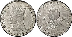 Primera moneda patria de 8 reales de 1819