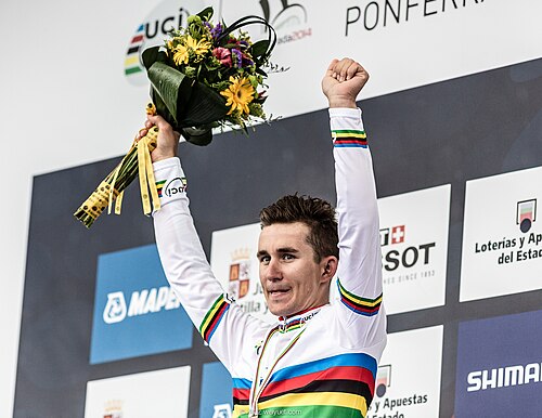 Michał Kwiatkowski en el podio del Campeonato Mundial de Ruta 2014