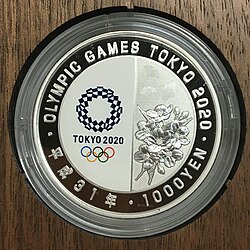 Moneda conmemorativa con el logotipo oficial de Tokio 2020.